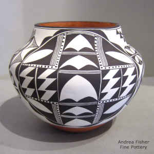Black and white 4-panel geometric design on a polychrome jar