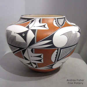 Clouds, rain and geometric design on a polychrome jar