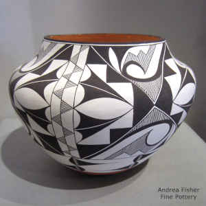 Black and white geometric design on a polychrome jar