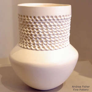 Tall corrugated neck on a white jar