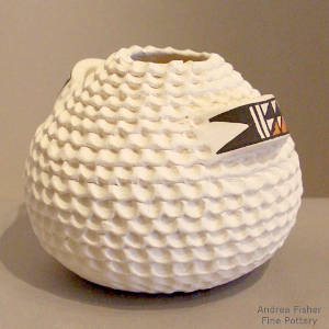 Handles on a corrugated white jar