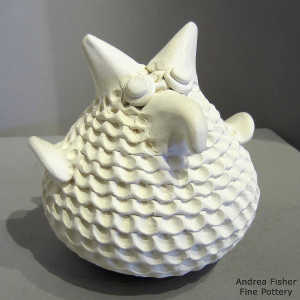 White owl with a corrugated surface