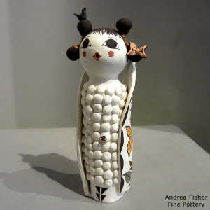 Lady bug, butterfly, bird and nature design on a Corn Maiden figure