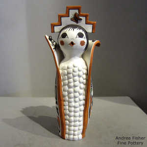 Lizard, kokopelli and geometric design on a Corn Maiden figure with a tablita
