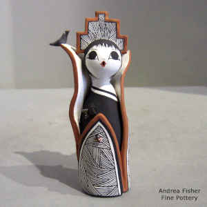 Tablita, butterfly, bird, lady bug and a geometric design on a polychrome Corn Maiden