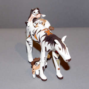 Three children, a cat, butterflies and lady bugs on a horse