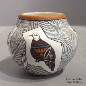 Miniature polychrome jar with bird, lizard, turtle, fine line and geometric design