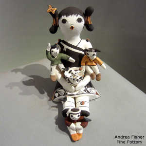 3 children, butterfly, bird, lady bug and a puppy on a grandmother storyteller