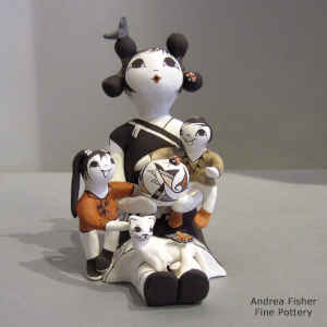 Bird, lady bug, kitten and 2 children on a grandmother storyteller