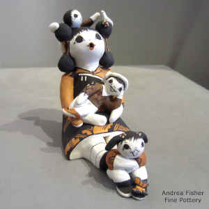 Bird, lady bug and 3 children on a grandmother storyteller