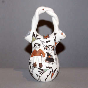 Married couple, bird, butterfly, lady bugs and geometric design on a polychrome wedding vase