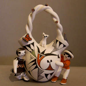 Husband, wife, cat and a geometric design on a polychrome wedding vase