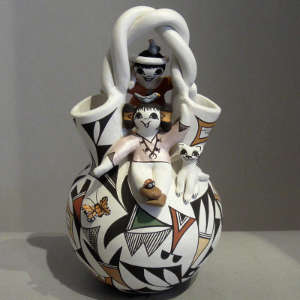 Traditional geometric designs and raised accents on a wedding vase storyteller