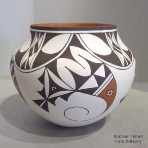 Bird element and geometric design on a polychrome jar