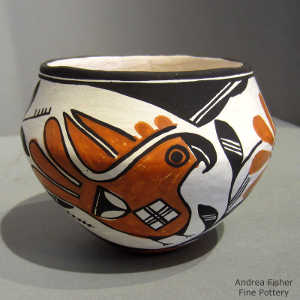 Parrot, branch and geometric design on a polychrome jar