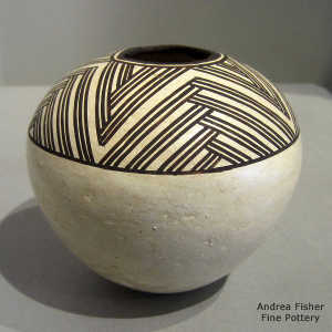 Geometric design on a black and white jar