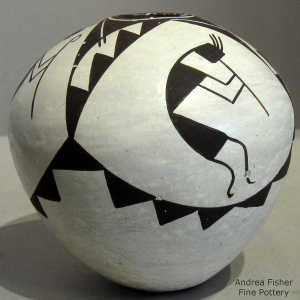 Kiva step, kokopelli and geometric design on a black and white seed pot