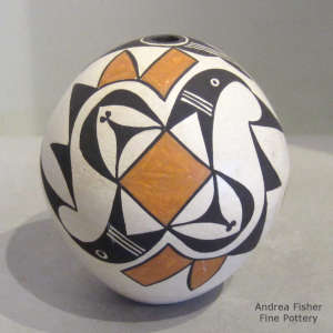 Geometric design on a polychrome seed pot