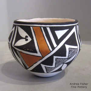 Kiva step, fine line and geometric design on a polychrome jar