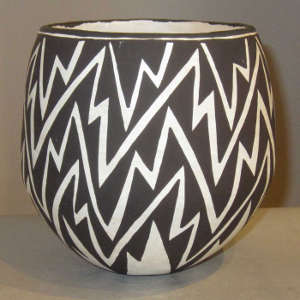 Lightning bolt design on a black and white jar