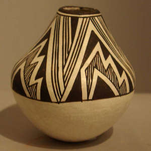 Lightning bolt and rain design on a black and white jar