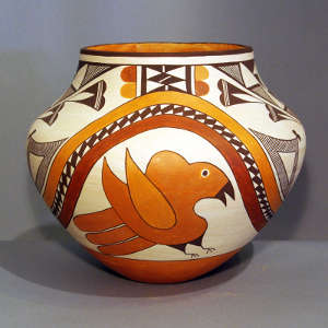 Bird, rainbow and geometric designs on a polychrome jar