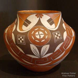 Medallion and geometric design on a polychrome jar