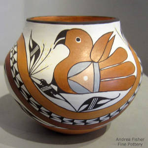 Parrot, rainbow and geometric design on  polychrome jar