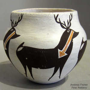 Deer and heart line design on a polychrome jar
