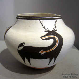Deer and heart line design on a polychrome jar