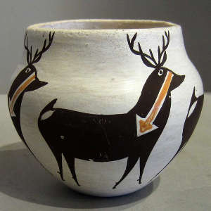 Deer and heart line design on a polychrome jar