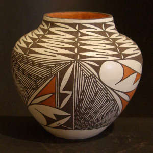 Fine line and geometric design on a polychrome jar