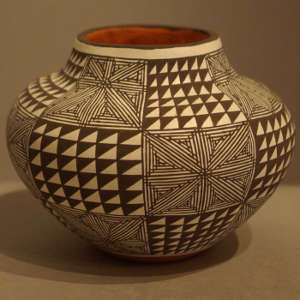 Geometric design on a black and white jar