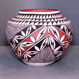 Fine line and geometric design on a polychrome jar