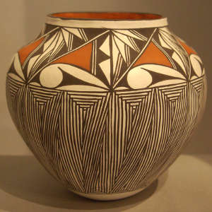 Geometric and fine line design on a polychrome jar