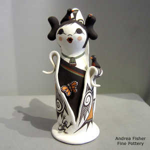 Birds, butterfly and geometric design on a polychrome Corn Maiden