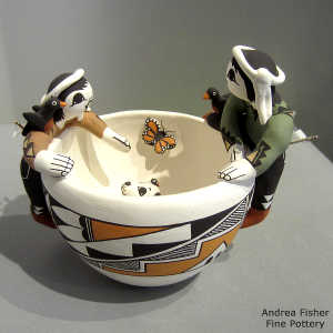 2 children, puppy, birds, butterfly and a geometric design on a friendship bowl