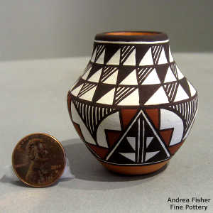 Kiva step and geometric design on a miniature polychrome jar