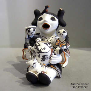 Two children on a grandmother storyteller