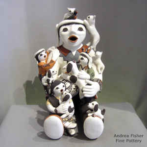 3 children, puppies, kittens, birds and butterfly on a grandfather storyteller