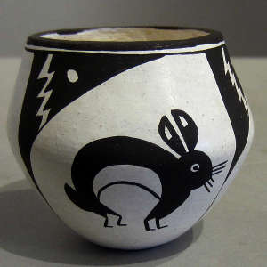 Mimbres rabbit and geometric design on a black and white jar