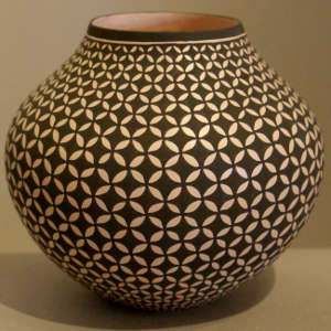 Geometric design on a black and white jar