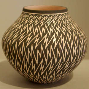 Lightning bolt design on a black and white jar