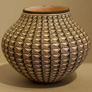 Geometric design on a black and white jar