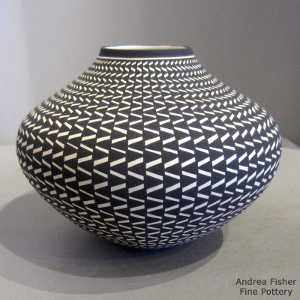 Geometric design on a black and white jar