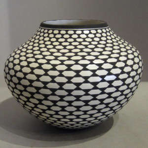 Geometric design on a black and white jar
