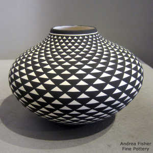 Geometric design on a black and white jar