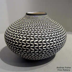 Geometric design on a black and white jar