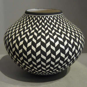 Geometric design on a black and white jar