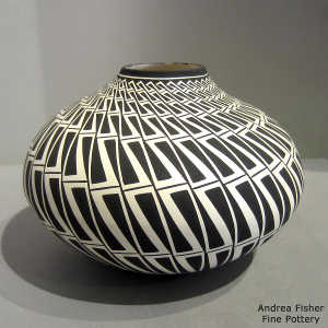 Geometric design on a black and white jar